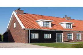 Holiday home with whirlpool and sauna in a quiet area in Zeeland